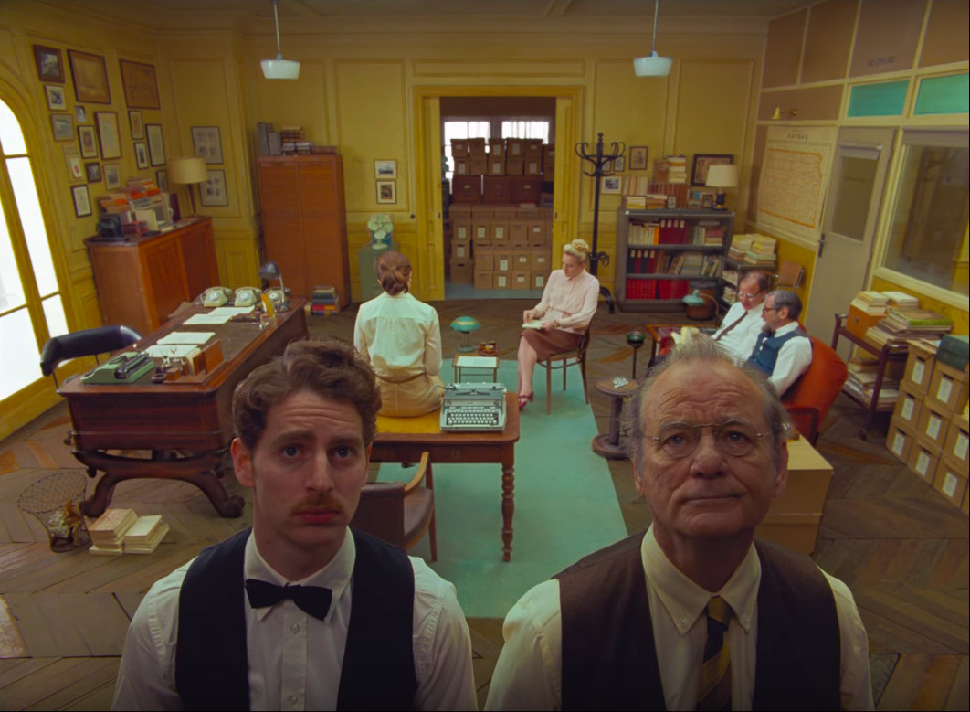 Bill Murray and other cast in The French Dispatch.