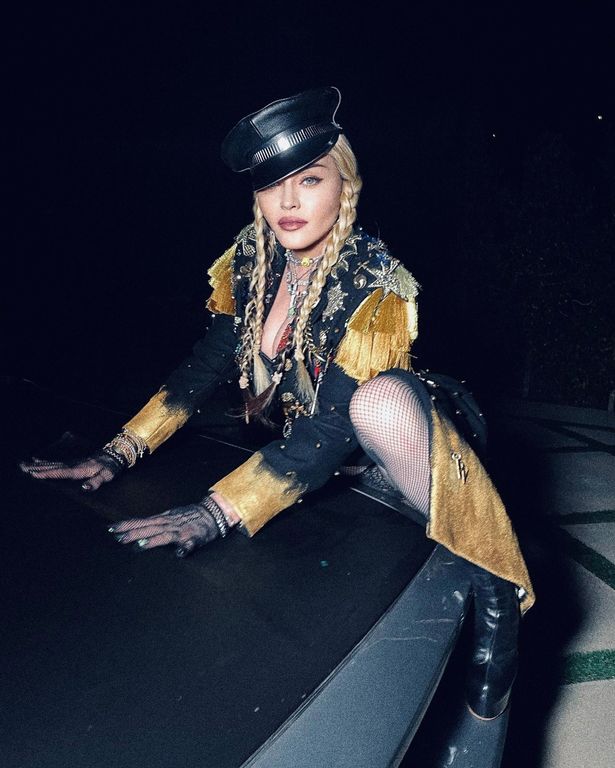 Madonna slammed by rapper Nelly who tells her to 'cover up' after sexy photoshoot