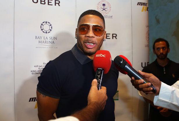 Madonna slammed by rapper Nelly who tells her to 'cover up' after sexy photoshoot