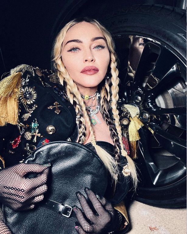 Madonna slammed by rapper Nelly who tells her to 'cover up' after sexy photoshoot